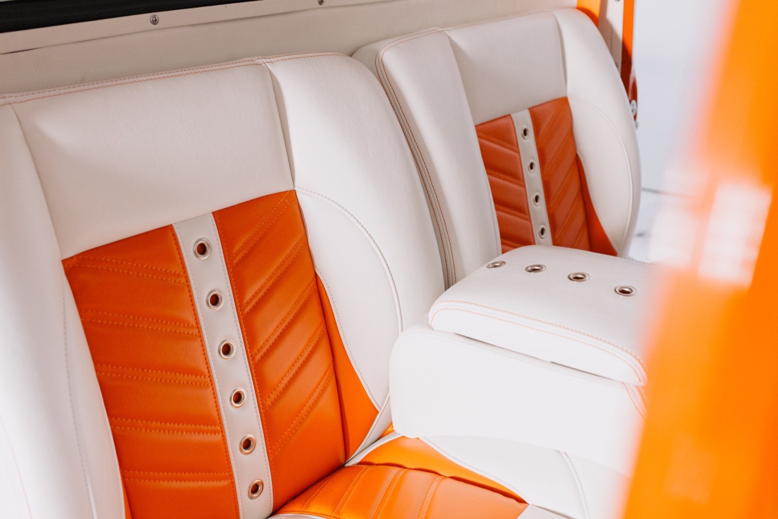 1956 Ford F-100 stepside in vibrant orange, restored by Morgan Muscle Cars in Pelham, Alabama