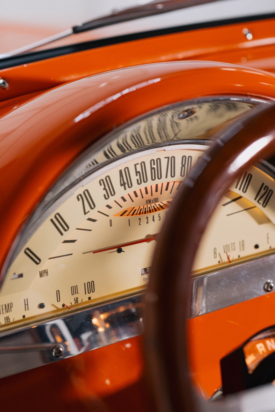 1956 Ford F-100 stepside in vibrant orange, restored by Morgan Muscle Cars in Pelham, Alabama