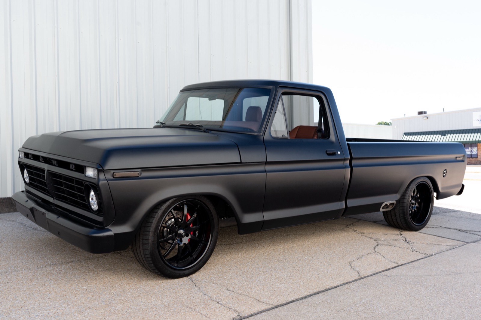 1973 Ford F-100 in satin black, restored by Morgan Muscle Cars
