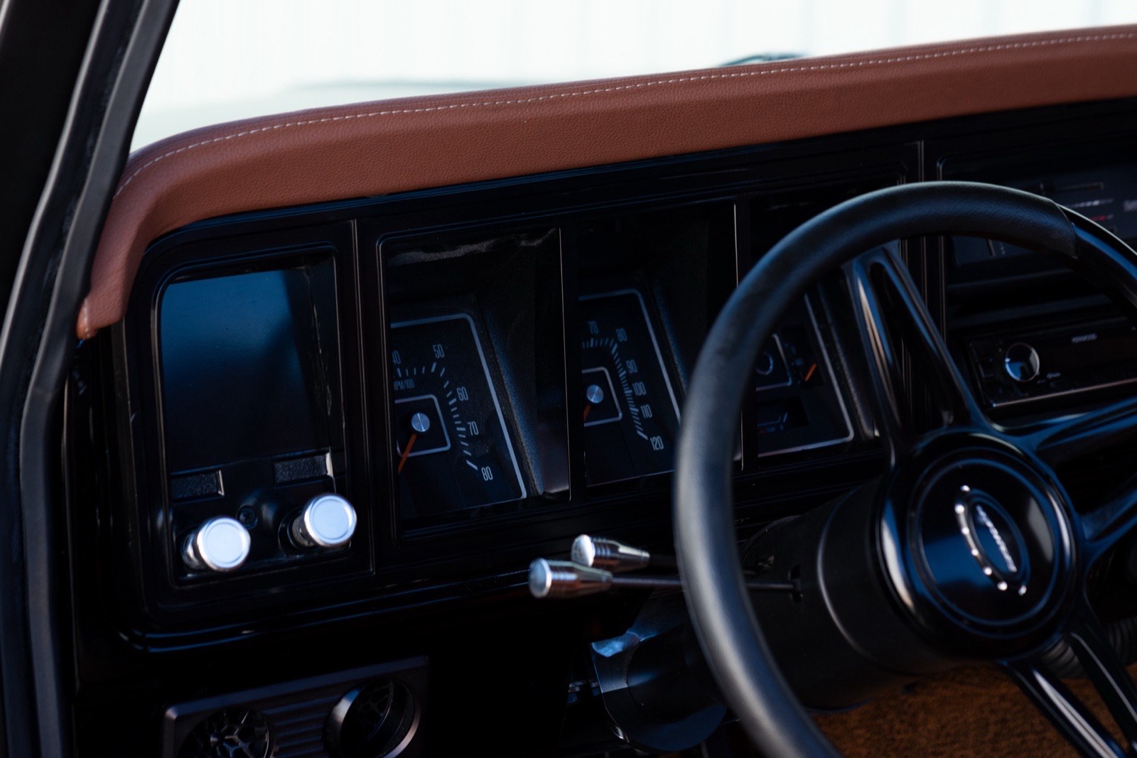 1973 F-100 Coyote 5.0 resto-mod — satin black with Tremec 6-speed, Morgan Muscle Cars