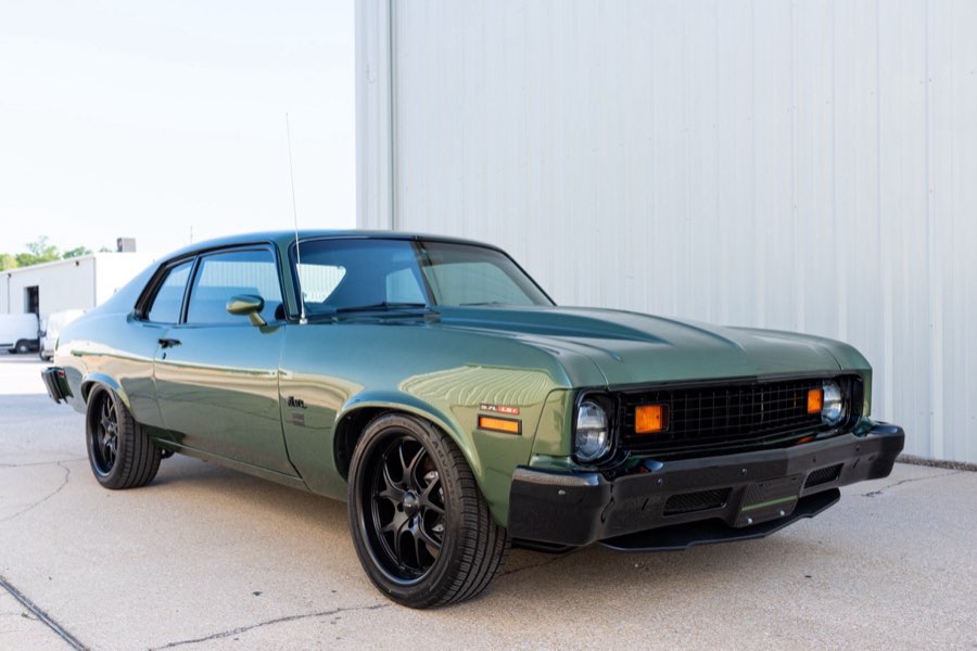 1973 Chevrolet Nova in olive green — front three-quarter view, restored by Morgan Muscle Cars