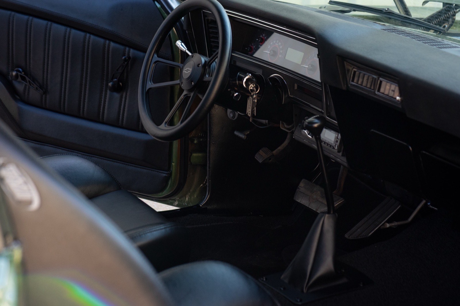 1973 Chevrolet Nova in olive green, restored by Morgan Muscle Cars in Pelham, Alabama